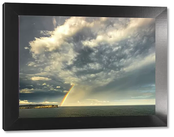 Rainbow and storm clouds over North Head, Sydney, New South Wales, Australia