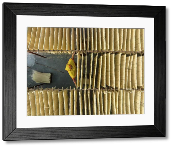 Framed Print : Aerial view of people working in the traditional vermicelli factory in Bogura, Bangladesh Framed Print : Aerial view of people working in the traditional vermicelli factory in Bogura, Bangladesh