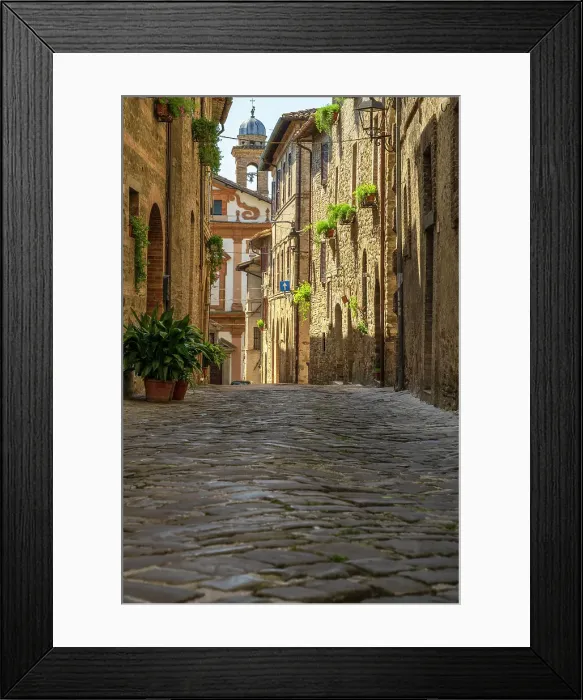 Framed Print : Italy, Umbria. A little ancient street made with cobblestones in the town centre of Bevagna Framed Print : Italy, Umbria. A little ancient street made with cobblestones in the town centre of Bevagna