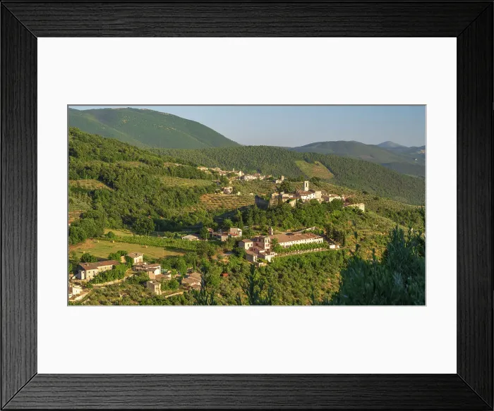 Framed Print : Italy, Umbria. The little village of Campello Alto near Trevi seen from the pilgrimage path of the Via di Francesco Framed Print : Italy, Umbria. The little village of Campello Alto near Trevi seen from the pilgrimage path of the Via di Francesco