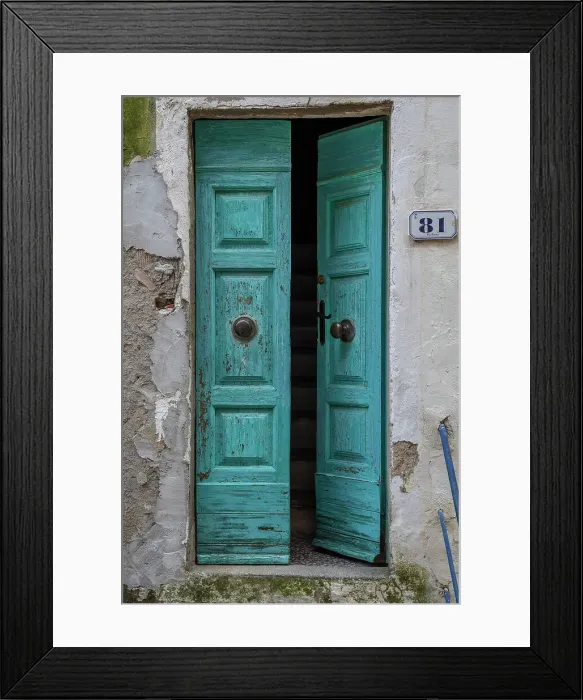 Framed Print : Italy, Tuscany, Elba. An old wooden entrance door to a house in Capoliveri Framed Print : Italy, Tuscany, Elba. An old wooden entrance door to a house in Capoliveri