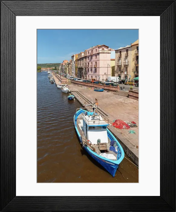 Framed Print : Fishing boat on the shore of Temo river, Bosa, Oristano district, Sardinia, Italy Framed Print : Fishing boat on the shore of Temo river, Bosa, Oristano district, Sardinia, Italy