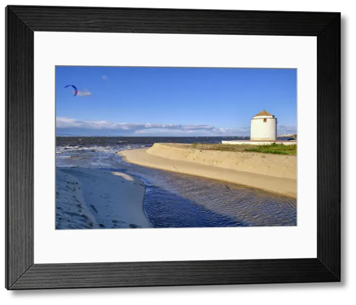 Framed Print : Praia dos Moinhos (Beach of the Windmills) and Tagus river with kite surfers. Alcochete, Portugal Framed Print : Praia dos Moinhos (Beach of the Windmills) and Tagus river with kite surfers. Alcochete, Portugal