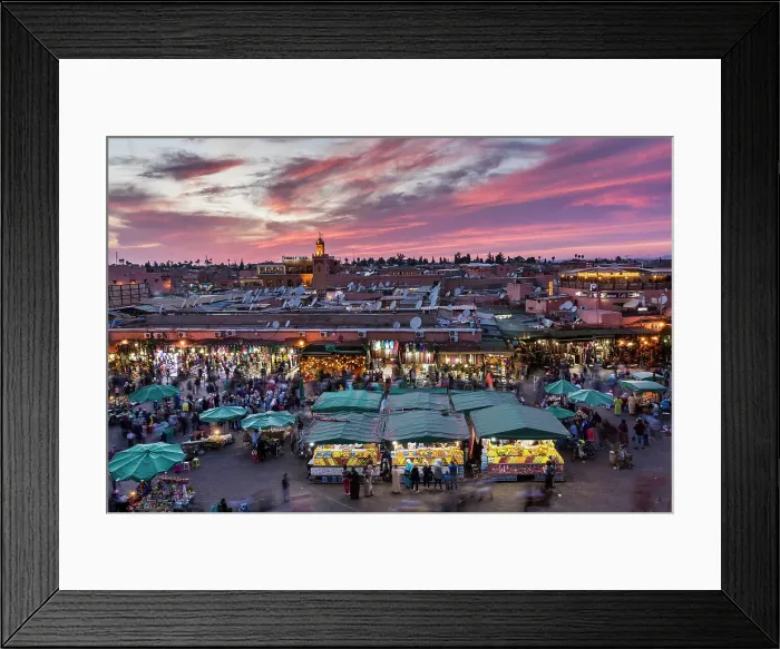 Framed Print : View over Djemaa el-Fna square and market place toward Koutoubia Mosque at dusk, Marrakesh, Morocco Framed Print : View over Djemaa el-Fna square and market place toward Koutoubia Mosque at dusk, Marrakesh, Morocco
