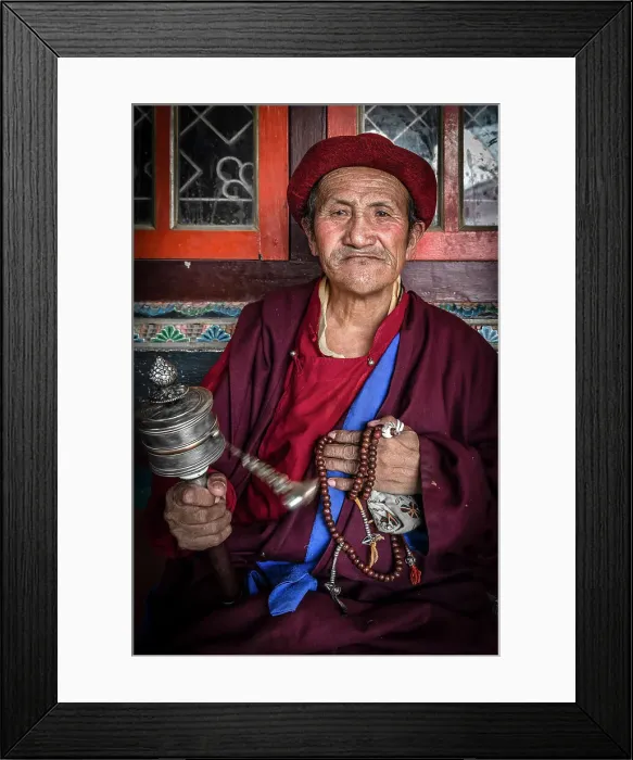 Framed Print : Devotee spinning prayer wheel at Boudhanath Stupa, Kathmandu, Nepal Framed Print : Devotee spinning prayer wheel at Boudhanath Stupa, Kathmandu, Nepal