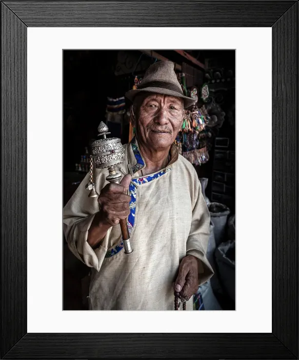 Framed Print : Tibetan man spinning prayer wheel at Boudhanath Stupa, Kathmandu, Nepal Framed Print : Tibetan man spinning prayer wheel at Boudhanath Stupa, Kathmandu, Nepal