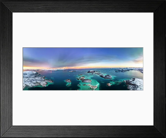 Framed Print : Dramatic sky at dawn over the icy sea and Sommaroy island covered with snow, aerial view, Troms county, Norway Framed Print : Dramatic sky at dawn over the icy sea and Sommaroy island covered with snow, aerial view, Troms county, Norway