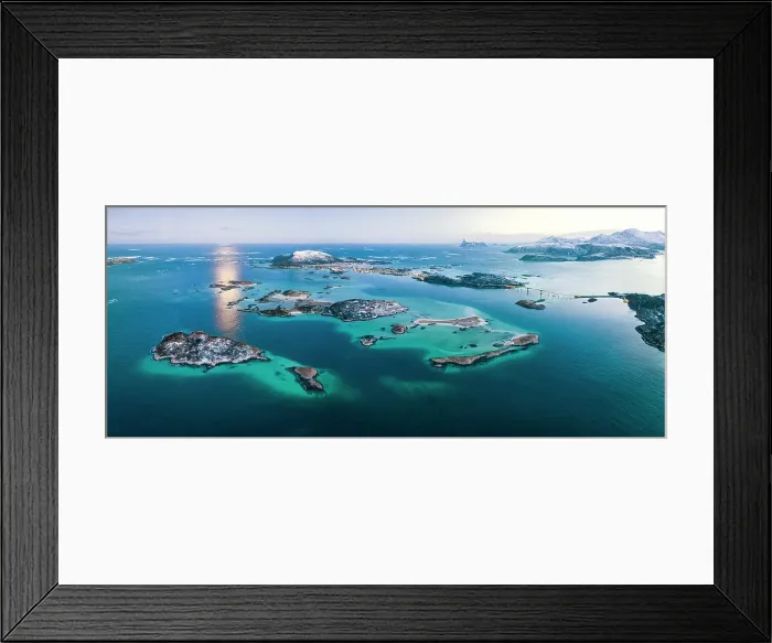 Framed Print : Aerial view of snowy islets in the middle of the cold turquoise sea at dusk, Sommaroy, Troms county, Norway Framed Print : Aerial view of snowy islets in the middle of the cold turquoise sea at dusk, Sommaroy, Troms county, Norway