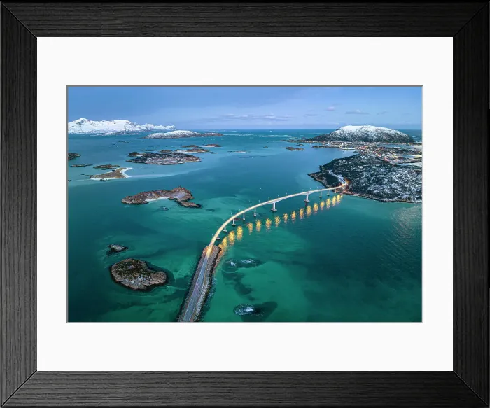 Framed Print : Aerial view of Sommaroy island and majestic bridge along a fjord in winter, Troms county, Norway Framed Print : Aerial view of Sommaroy island and majestic bridge along a fjord in winter, Troms county, Norway