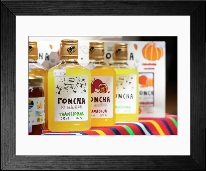 Framed Print : Small bottles of poncha on display at Farmers Market (Mercado dos Lavradores), Funchal, Madeira, Portugal Framed Print : Small bottles of poncha on display at Farmers Market (Mercado dos Lavradores), Funchal, Madeira, Portugal