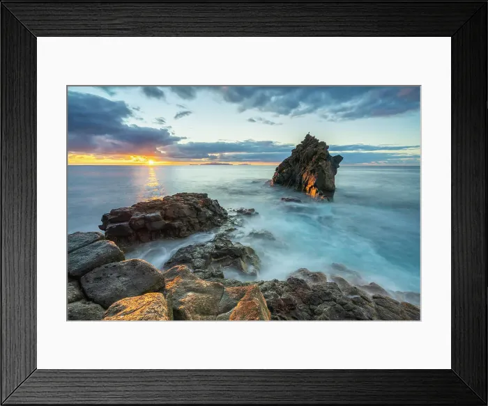Framed Print : Seascape at rocky coast of Santa Cruz at sunrise, Madeira, Portugal Framed Print : Seascape at rocky coast of Santa Cruz at sunrise, Madeira, Portugal