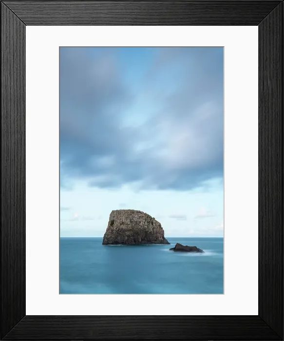 Framed Print : Seascape with rock in ocean by coast of Porto da Cruz at dusk, Machico District, Madeira, Portugal Framed Print : Seascape with rock in ocean by coast of Porto da Cruz at dusk, Machico District, Madeira, Portugal