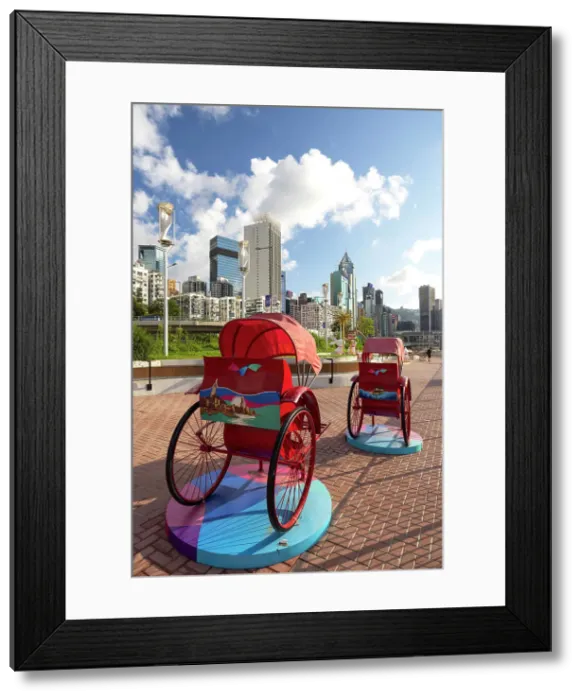 Framed Print : Rickshaws on promenade, Causeway Bay, Hong Kong Island, Hong Kong Framed Print : Rickshaws on promenade, Causeway Bay, Hong Kong Island, Hong Kong
