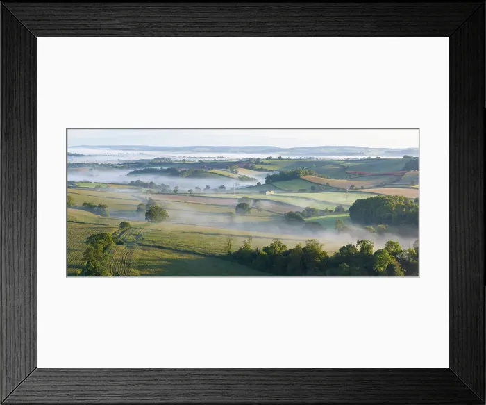 Framed Print : Mist shrouded rolling countryside near Berry Pomeroy in the South Hams of Devon, England. Autumn (September) 2023