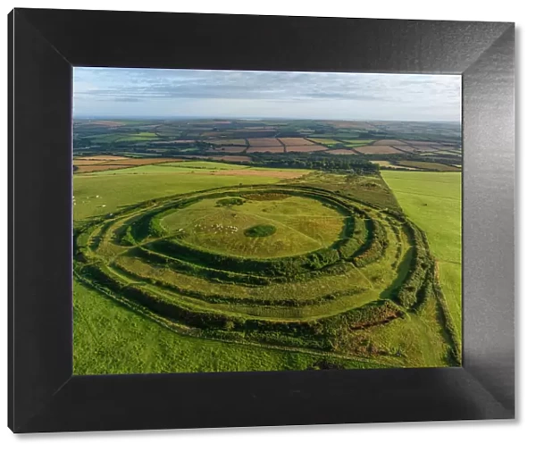 Aerial view of Castle an Dinas Iron Age Hillfort on Castle Downs near St Columb Major, Cornwall, England. Summer (August) 2023