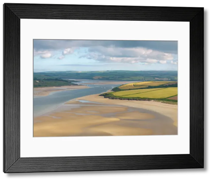 Framed Print : The Doom Bar is revealed at low tide in the Camel Estuary near Padstow, Cornwall, England. Summer (June) 2023