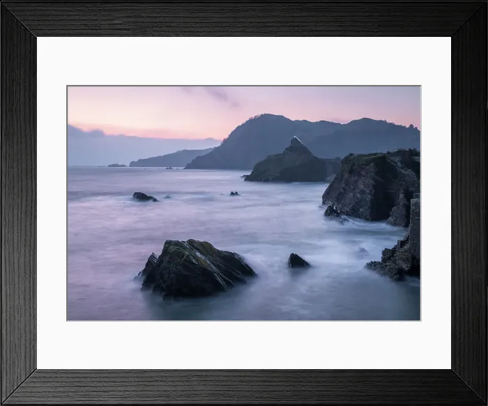 Framed Print : Dawn pink sky above Ilfracombe's rugged coast from Capstone Hill, Ilfracombe, Devon, England. Spring (April) 2023 Framed Print : Dawn pink sky above Ilfracombe's rugged coast from Capstone Hill, Ilfracombe, Devon, England. Spring (April) 2023
