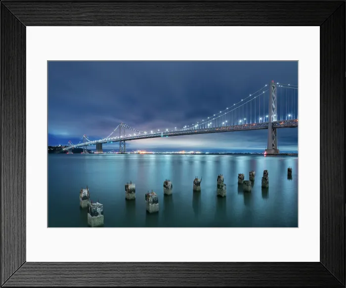 Framed Print : Oakland Bay Bridge against cloudy sky at twilight, San Francisco, San Francisco Peninsula, San Francisco Bay Area, California, USA