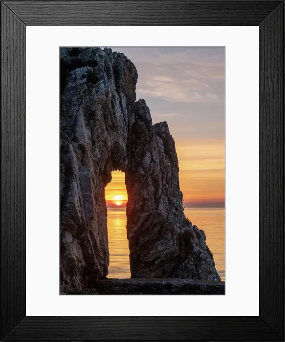 Framed Print : Sunrise through a rock arch at the Victorian brickworks site at Porth Wen, Anglesey, Wales, UK. Spring (May) 2019 Framed Print : Sunrise through a rock arch at the Victorian brickworks site at Porth Wen, Anglesey, Wales, UK. Spring (May) 2019