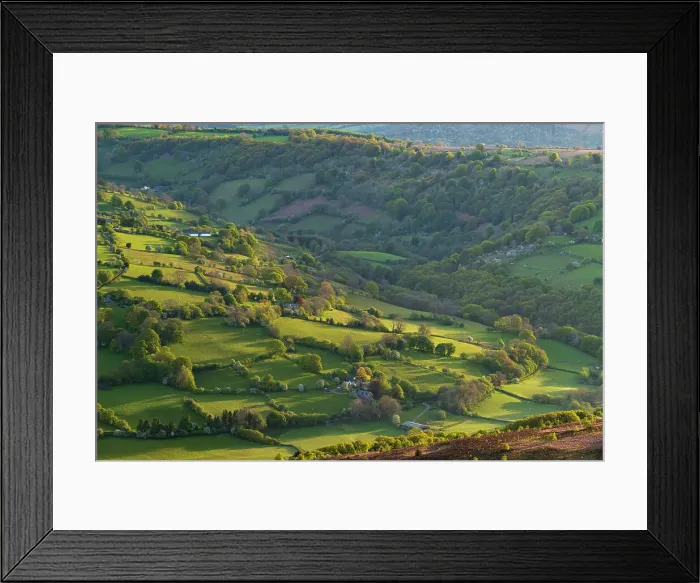 Framed Print : Beautiful morning sunlight on the rolling green fields of Bannau Brycheiniog, formerly known as the Brecon Beacons, from Sugar Loaf mountain, Abergavenny, Powys, Wales, UK. Spring (May) 2019 Framed Print : Beautiful morning sunlight on the rolling green fields of Bannau Brycheiniog, formerly known as the Brecon Beacons, from Sugar Loaf mountain, Abergavenny, Powys, Wales, UK. Spring (May) 2019