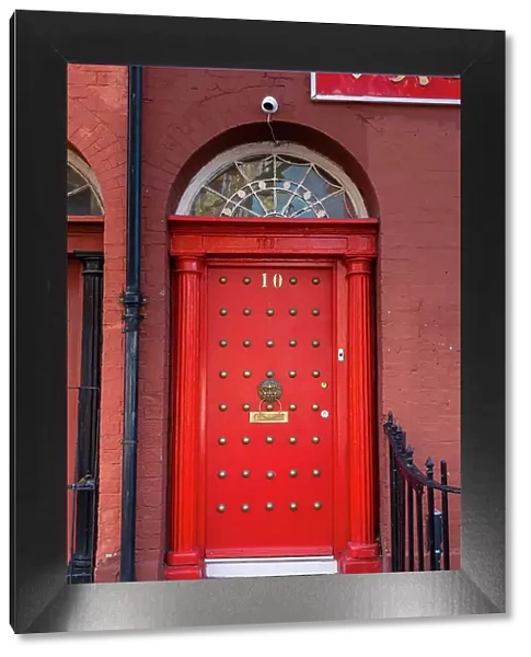 Red door in China Town, Liverpool, Merseyside, England, UK