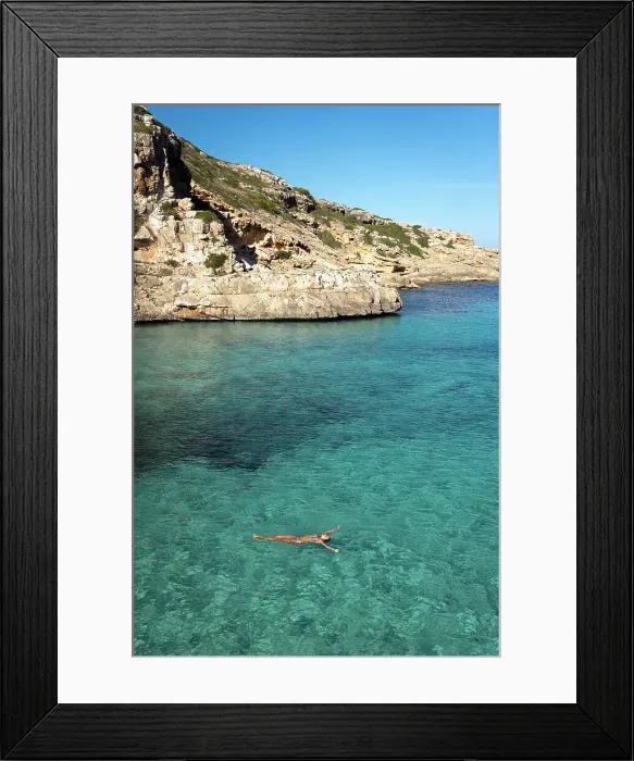 Framed Print : Woman floating in the water, Mallorca, Spain Framed Print : Woman floating in the water, Mallorca, Spain
