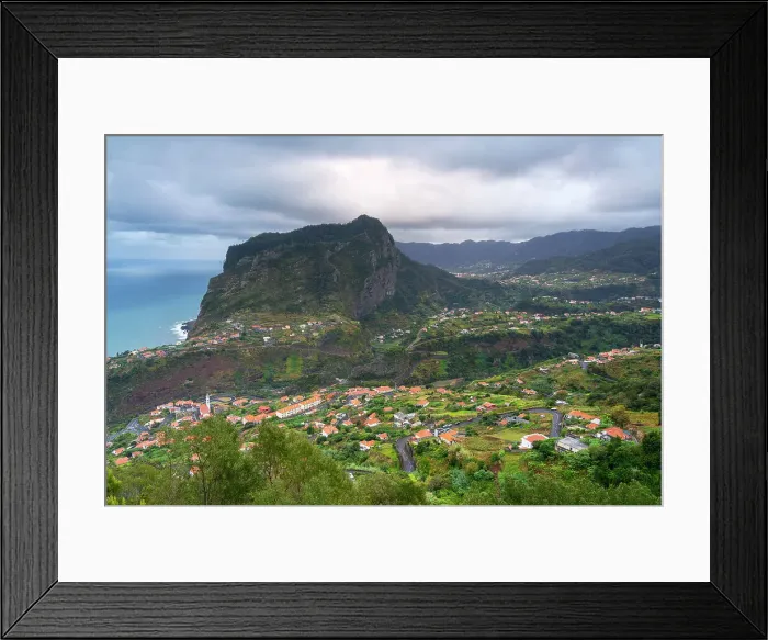 Framed Print : Town of Faial near mountains against cloudy sky, Santana, Madeira, Portugal Framed Print : Town of Faial near mountains against cloudy sky, Santana, Madeira, Portugal