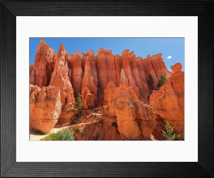 Framed Print : Hikers walking on a trail among hoodoos on Queens Garden Trail inside Bryce Canyon, Bryce Canyon National Park, Utah, USA Framed Print : Hikers walking on a trail among hoodoos on Queens Garden Trail inside Bryce Canyon, Bryce Canyon National Park, Utah, USA