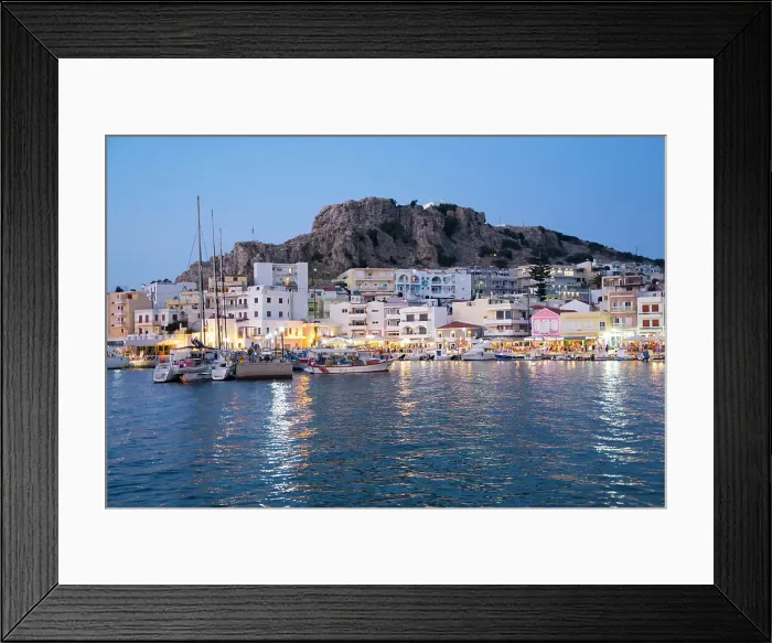 Framed Print : Greece, Dodecanese, Karpathos, the illuminated port city of Pigadia in the evening Framed Print : Greece, Dodecanese, Karpathos, the illuminated port city of Pigadia in the evening