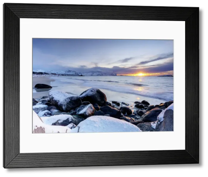 Framed Print : Romantic sky at sunset over the cold arctic sea washing the frozen Bovaer beach, Skaland, Senja, Troms county, Norway Framed Print : Romantic sky at sunset over the cold arctic sea washing the frozen Bovaer beach, Skaland, Senja, Troms county, Norway