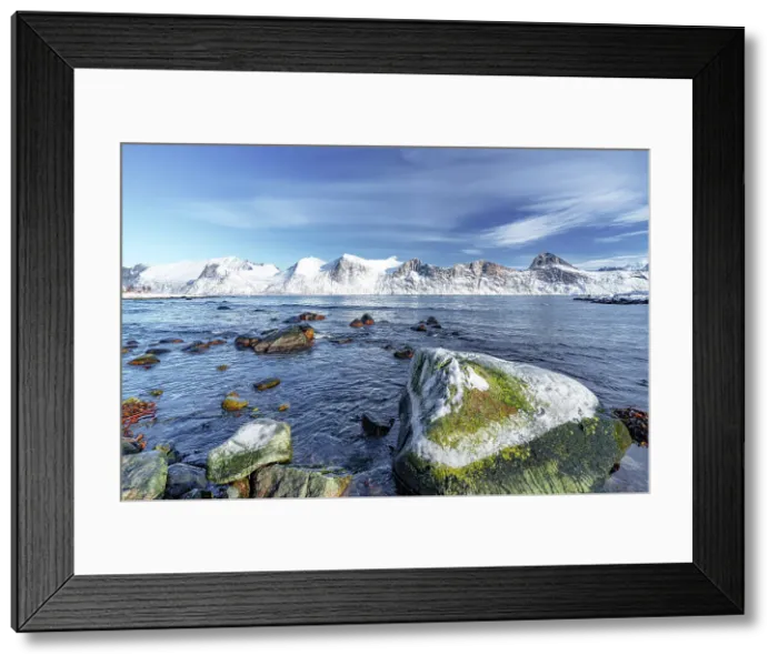 Framed Print : Snowcapped mountains along the cold sea in winter, Mefjordvaer, Senja, Troms county, Norway Framed Print : Snowcapped mountains along the cold sea in winter, Mefjordvaer, Senja, Troms county, Norway