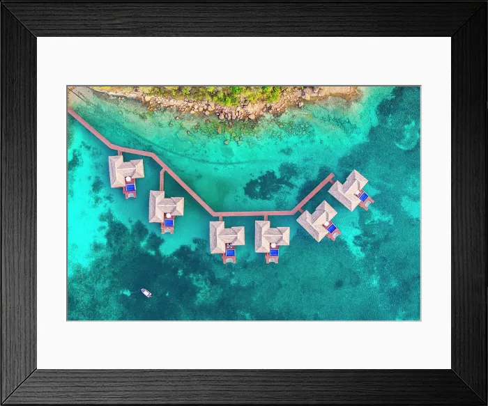 Framed Print : Overwater luxury bungalows with private pool in the crystal clear sea, aerial view, Antigua, Antigua & Barbuda, Caribbean Framed Print : Overwater luxury bungalows with private pool in the crystal clear sea, aerial view, Antigua, Antigua & Barbuda, Caribbean
