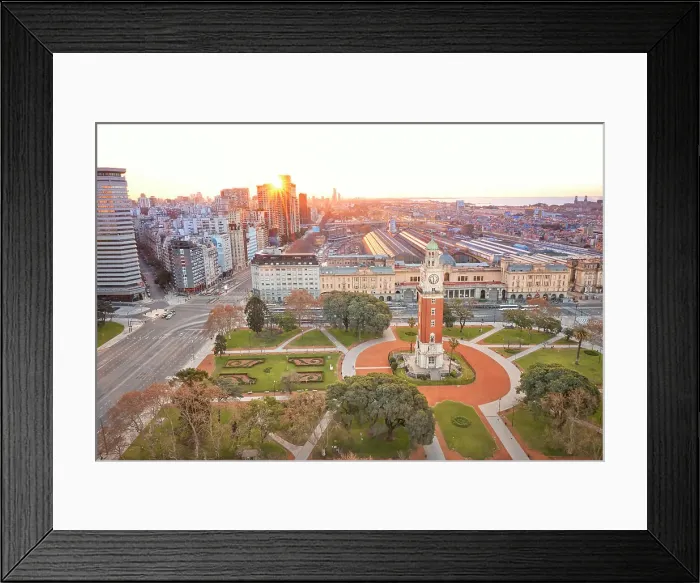 Framed Print : The Monumental Tower with the Retiro Train Station and La Plata River in the background at sunset, Buenos Aires, Argentina