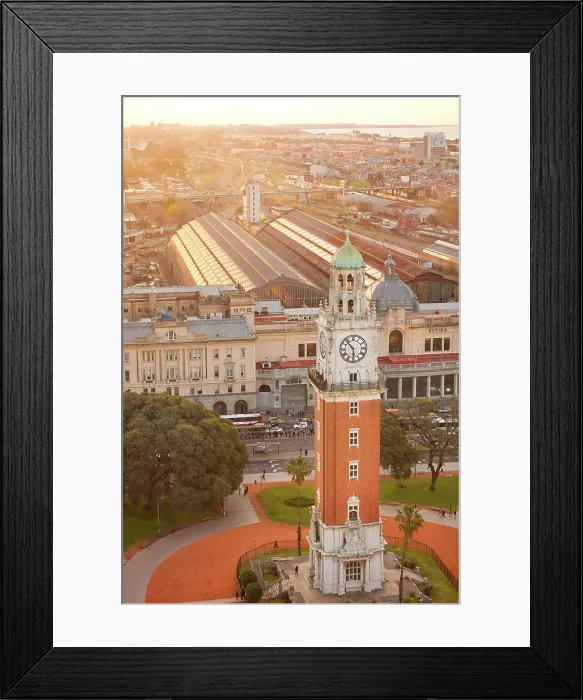 Framed Print : The Monumental Tower with the Retiro Train Station and La Plata River in the background at sunset, Buenos Aires, Argentina Framed Print : The Monumental Tower with the Retiro Train Station and La Plata River in the background at sunset, Buenos Aires, Argentina
