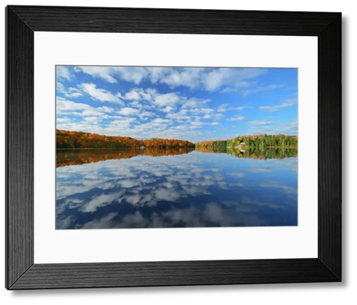 Framed Print : Clouds reflected in Horseshoe Lake. Autumn Near Parry Sound, Ontario, Canada Framed Print : Clouds reflected in Horseshoe Lake. Autumn Near Parry Sound, Ontario, Canada