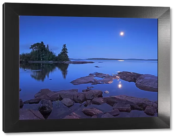 Reflection of Moon over Lake Superior and Caron Island Rossport, Ontario, Canada