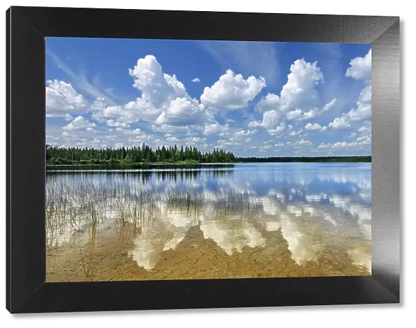 CLouds reflected in Burnfield Lake. Obatanga Provincial Lake, Ontario, Canada