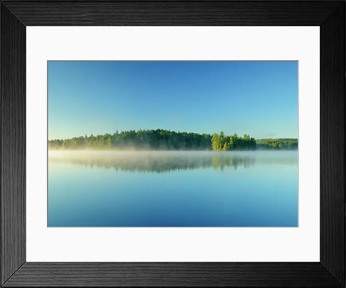 Framed Print : Reflection with morning fog rising on Cache Lake Algonquin Provincial Park, Ontario, Canada