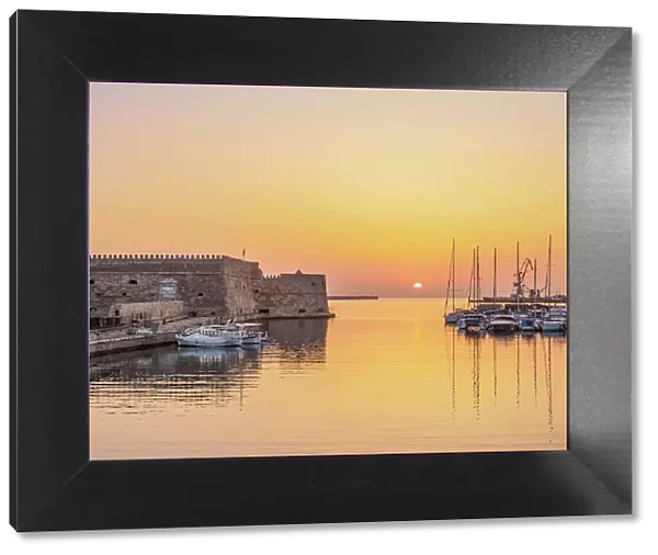Old Venetian Port and The Koules Fortress at sunrise, City of Heraklion, Crete, Greece