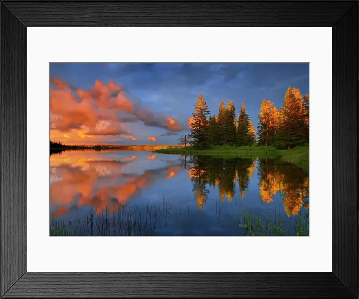 Framed Print : Clouds of stormy sky reflected in Whirlpool, Lake Riding Mountain National Park, Manitoba, Canada Riding Mountain National Park, Manitoba, Canada