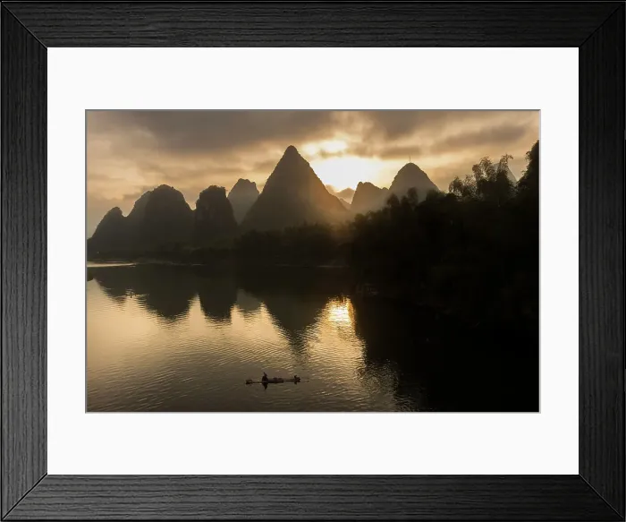 Framed Print : Karst mountains and bamboo fishing raft on Li River at sunrise, Yangshuo, China Framed Print : Karst mountains and bamboo fishing raft on Li River at sunrise, Yangshuo, China