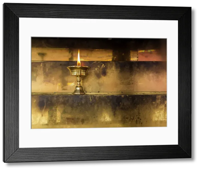 Framed Print : Candle in temple at Kerti Monastery, Langmusi, China Framed Print : Candle in temple at Kerti Monastery, Langmusi, China