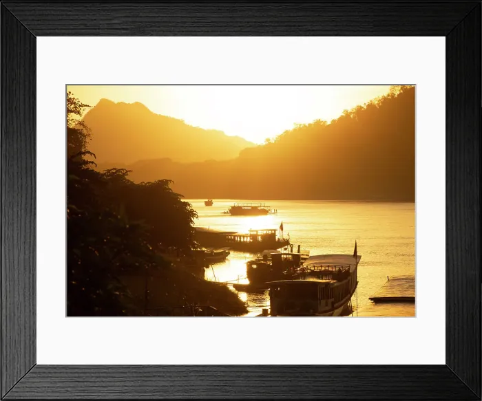 Framed Print : Boats at sunset on the Mekong river, Luang Prabang (ancient capital of Laos), Laos Framed Print : Boats at sunset on the Mekong river, Luang Prabang (ancient capital of Laos), Laos