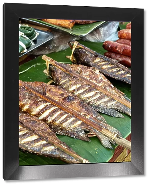 Street food, (grilled fish), Luang Prabang (ancient capital of Laos on the Mekong river), Laos