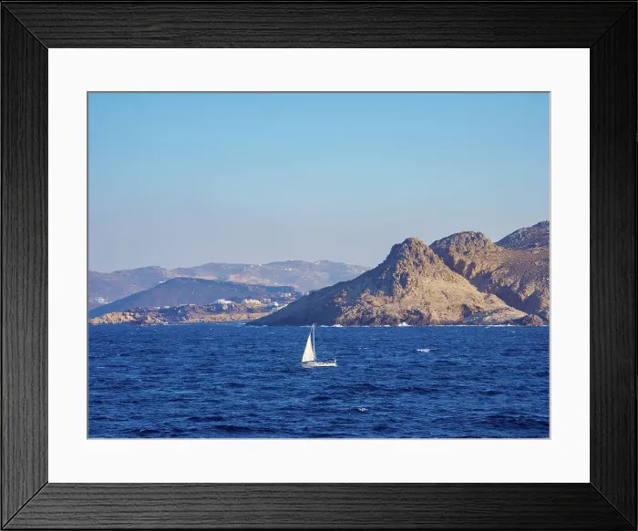 Framed Print : Sailboat by the coast of Mykonos Island, Cyclades, Greece Framed Print : Sailboat by the coast of Mykonos Island, Cyclades, Greece
