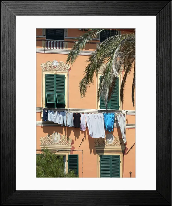 Framed Print : Detail of a clothes line on a building of the Piazza Garibaldi main square in the historical cask of Lerici, La Spezia, Liguria, Italy Framed Print : Detail of a clothes line on a building of the Piazza Garibaldi main square in the historical cask of Lerici, La Spezia, Liguria, Italy