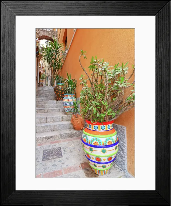Framed Print : Historic district street filled with artwork, Taormina, Sicily, Italy Framed Print : Historic district street filled with artwork, Taormina, Sicily, Italy
