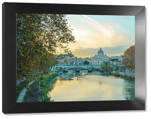 europe, Italy, Latium and Vatican. Sunset with Saint Peter´s Basilica and the river Tiber