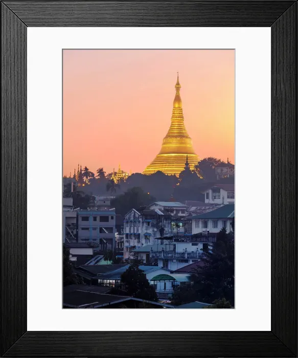 Framed Print : The golden stupa of the Shwedagon Pagoda (Shwedagon Zedi Daw) at twilight, Singuttara Hill, Yangon, Myanmar. It is considered the most sacred Buddhist pagoda in the country Framed Print : The golden stupa of the Shwedagon Pagoda (Shwedagon Zedi Daw) at twilight, Singuttara Hill, Yangon, Myanmar. It is considered the most sacred Buddhist pagoda in the country