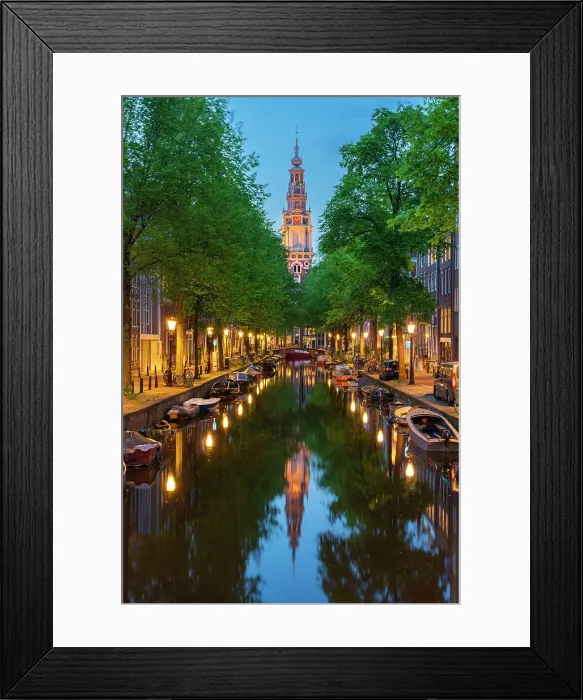 Framed Print : Zuiderkerk Tower near trees and buildings at Groenburgwal canal at twilight, Nieuwmarkt, Amsterdam, Netherlands Framed Print : Zuiderkerk Tower near trees and buildings at Groenburgwal canal at twilight, Nieuwmarkt, Amsterdam, Netherlands